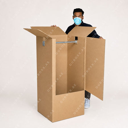 Wardrobe Box, Moving Wardrobe Box, Clothes Moving Box, Hanging Clothes Box, Wardrobe Moving Box, Box with Hanging Rod, Clothing Moving Box, Clothes Packing Box, Dress Moving Box, Suit Moving Box, Abaya Moving Box, 5 Ply Wardrobe Box, Heavy Duty Wardrobe Box, Large Wardrobe Box, 61x53.5x120CM Box, Moving Boxes Dubai, Moving Boxes UAE, Wardrobe Box Dubai, Wardrobe Box UAE, Clothes Box Dubai, Clothes Box UAE, Packing Boxes Dubai, Packing Boxes UAE, House Moving Boxes, Office Moving Boxes, Moving Packaging UAE,